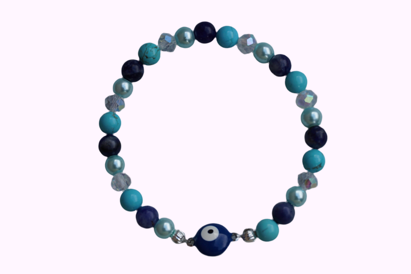 Rundes Armband aus Turquenit, Sodalith und hellblauer Acrylperlen sowie Glasperlen mit Nazaramulett-Anhänger