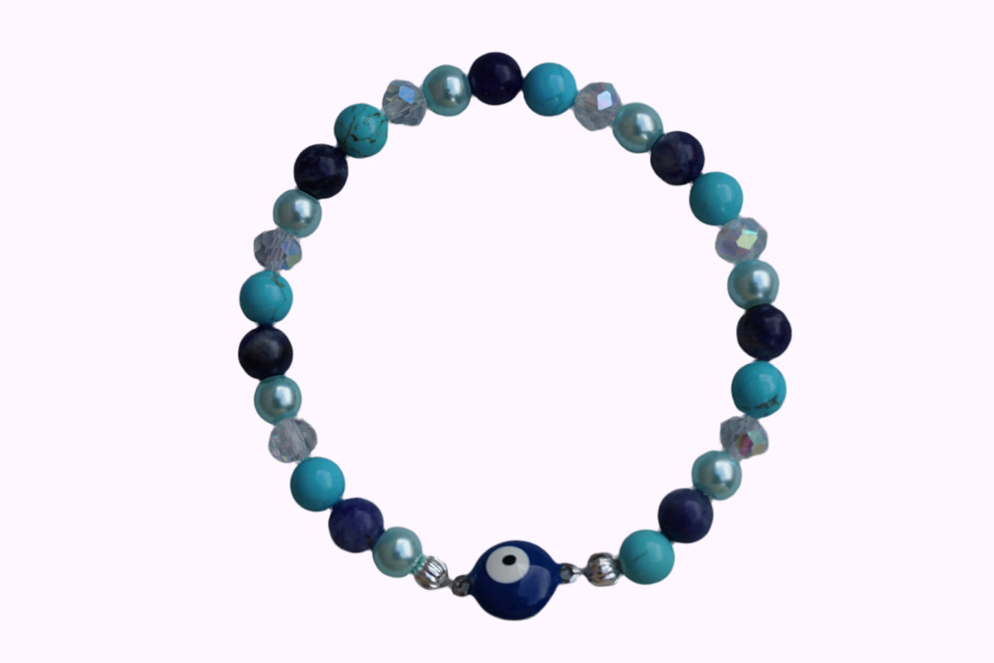 Rundes Armband aus Turquenit, Sodalith und hellblauer Acrylperlen sowie Glasperlen mit Nazaramulett-Anhänger